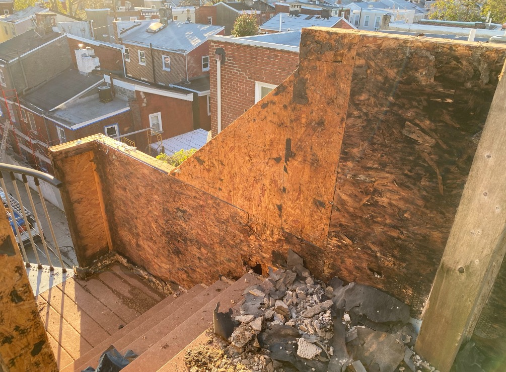 The parapet wall on the roof deck of this residence in Philadelphia was damaged due to the improper installation of the overlying stucco façade.