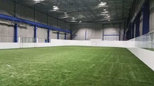 An ongoing renovation of an existing warehouse facility, turning it into indoor baseball and lacrosse practice fields. The 45,000 square foot building was at one time a steel fabrication facility.
